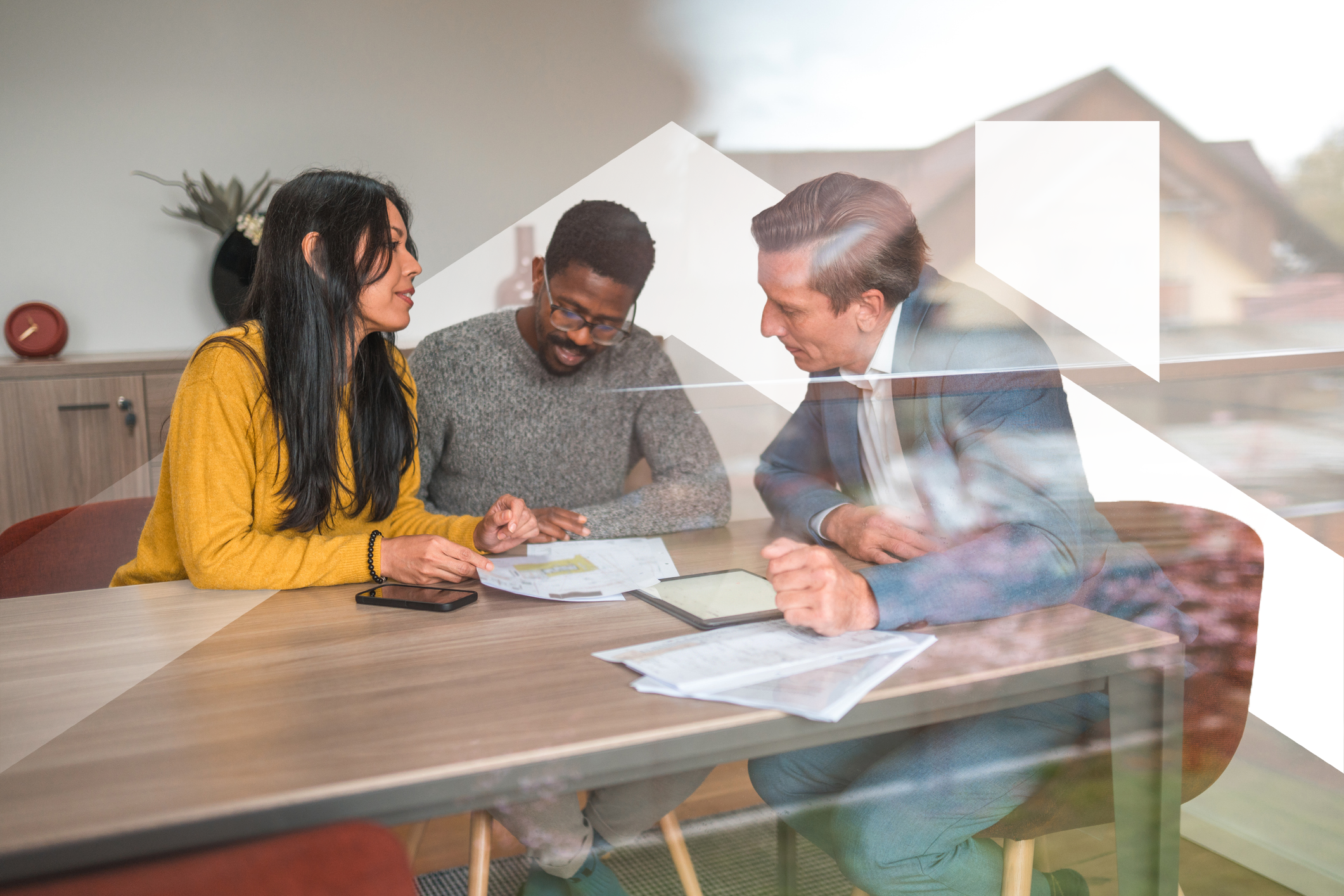 man and woman signing documents