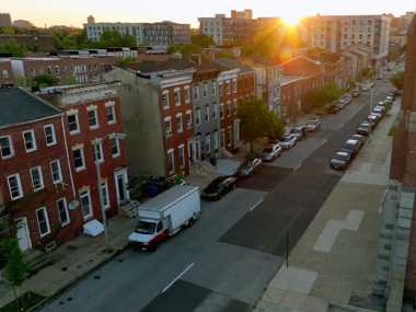 A high view of row home in a city neighborhood.