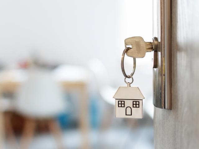 Key in door with home keychain