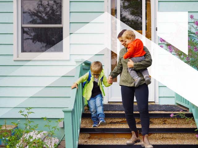 woman and two children walking down steps