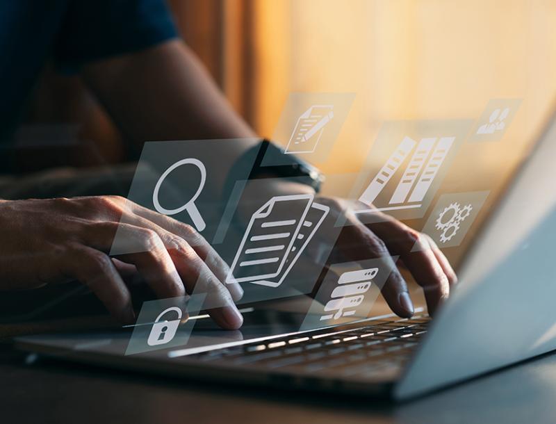 typing on computer with images