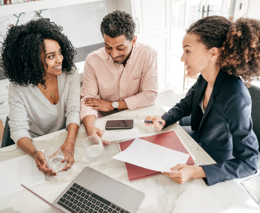 A group of people in a meeting